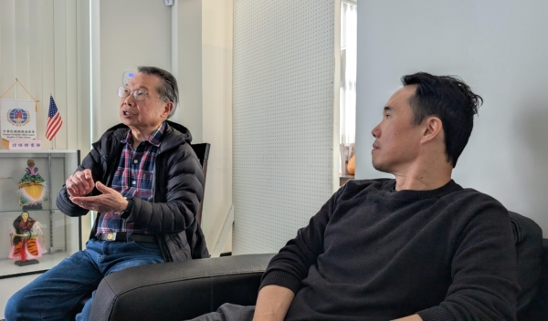 Charles Yu (right) shared his experience of Asian immigration to the United States with his father, Mingchuan Yu.