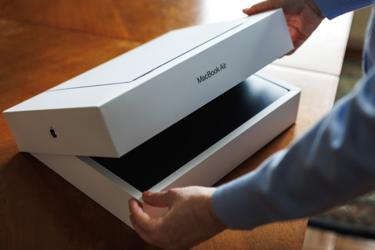 Unboxing a new Macbook air laptop.