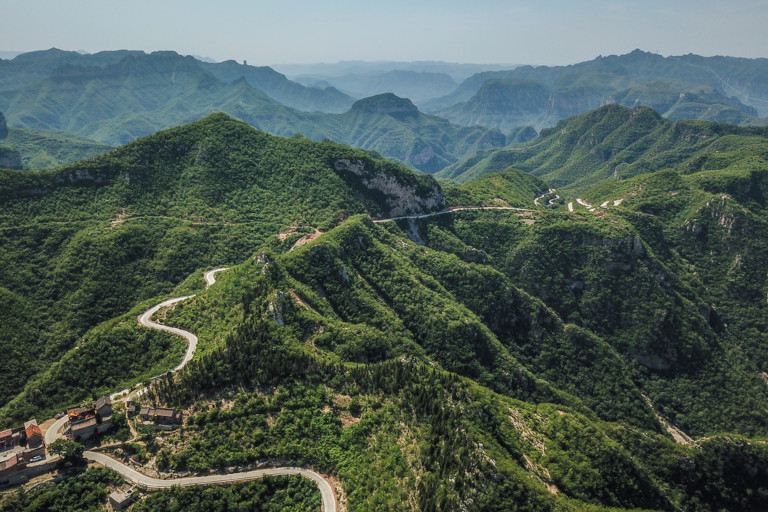 Road winding through the Taihang mountains in China.