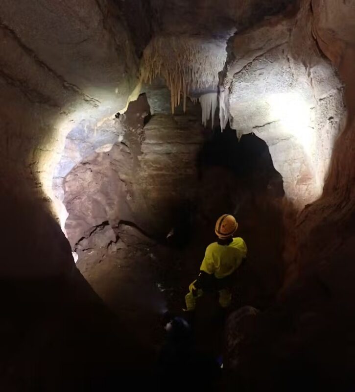 Descending the near-vertical passages of Foul Air Cave.