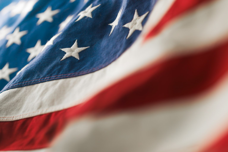 U.S. flag waving in the wind.