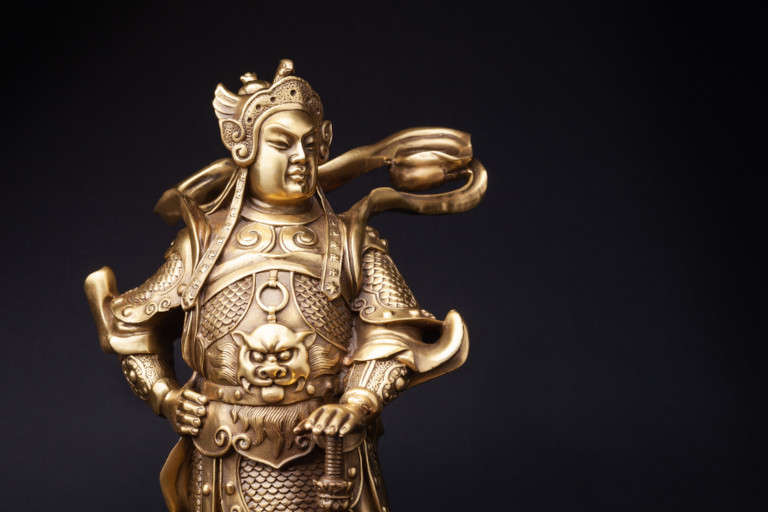 Golden statue of Weitou, the Guardian of the Law, in Chinese Buddhism.