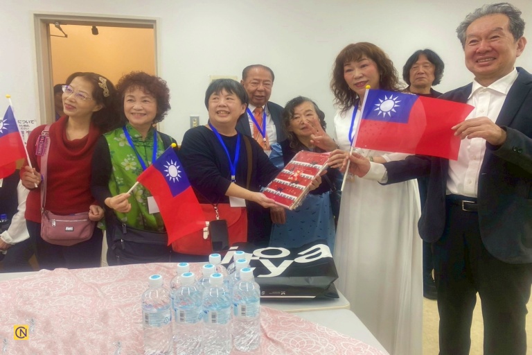 Audience members enthusiastically waved Republic of China (Taiwan) flags, adding vibrant energy to the welcome reception.