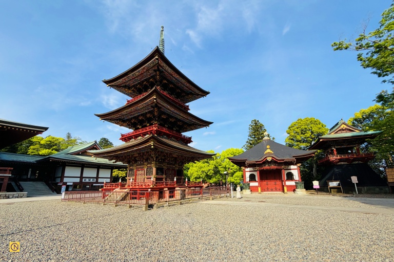 The elegant Three-Story Pagoda at Naritasan Shinshoji Temple is admired for its exquisite Edo-period craftsmanship and vibrant traditional decorations.