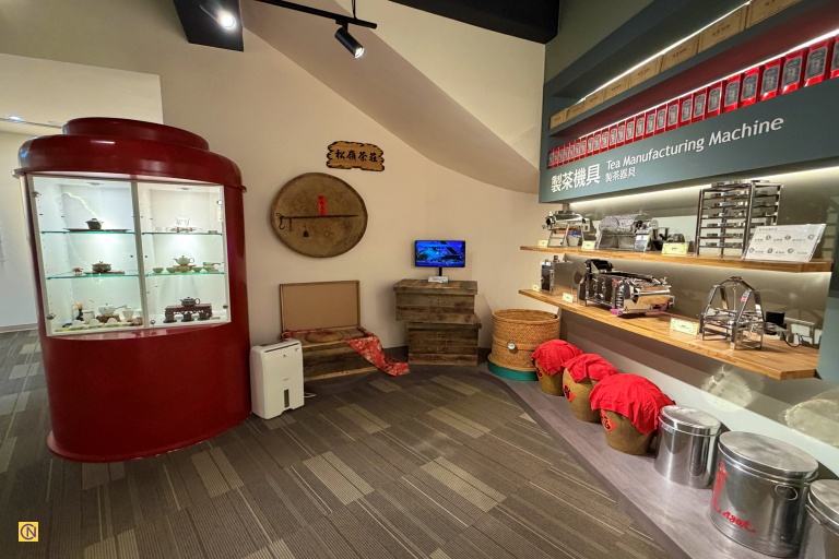 The center showcases a variety of tea-processing machines.