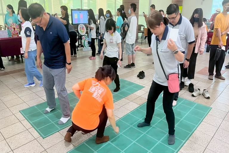 Local residents participate in the Japan-inspired Square-Stepping Exercise to promote healthy aging and dementia prevention.