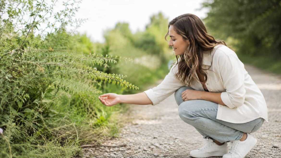 Woman reaching out to a plant. They seem alive and intelligent in an unexplainable way, as more scientific research is validating.