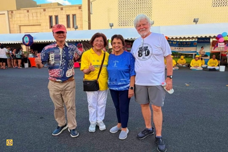Taiwan Falun Dafa practitioners greet Guam's Governor. Lou Leon Guerrero and the First Gentleman.