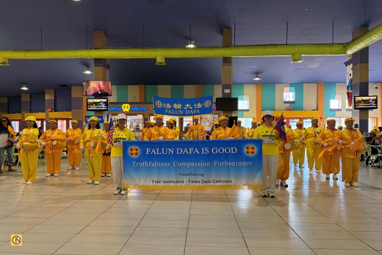 Taiwan's Falun Dafa Waist Drum Team delights shoppers at Guam Premier Outlets (GPO).