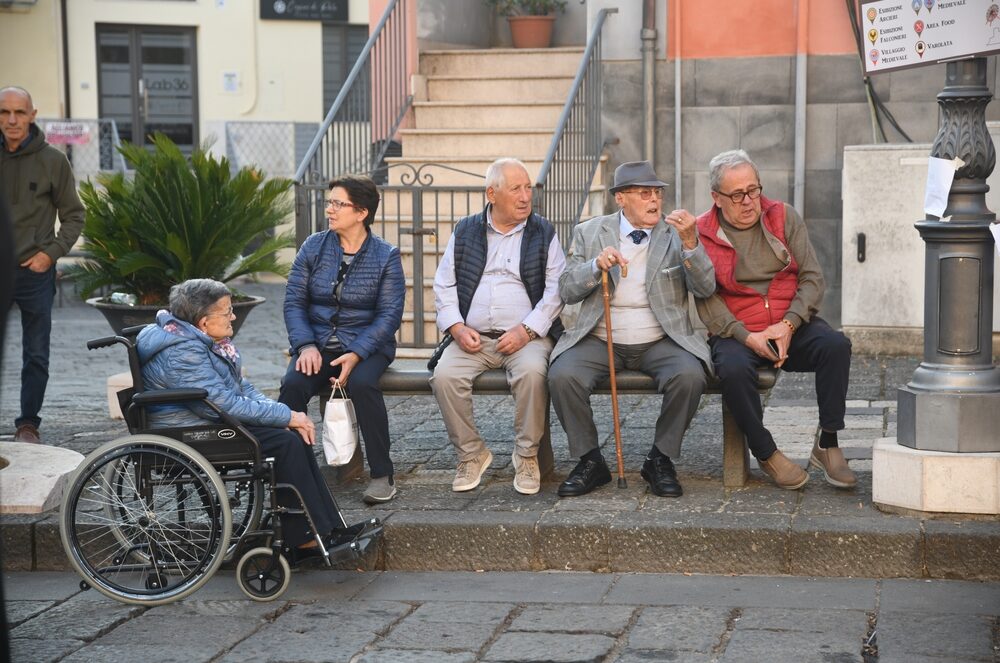 Italians speak with the whole body. A conversation is rarely just words; it is eyebrows, shoulders, and above all, hands.