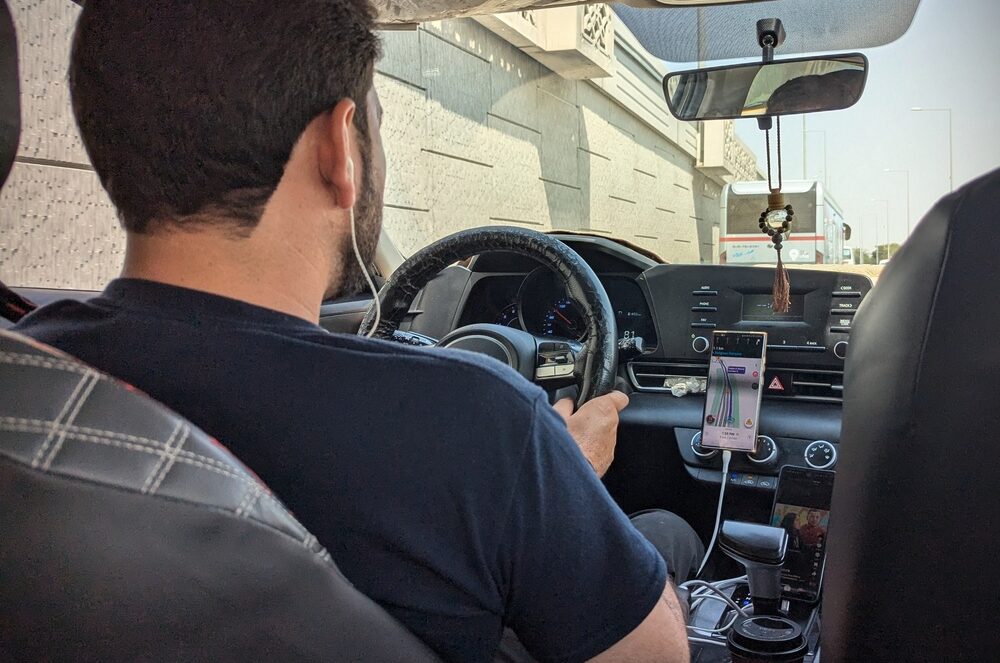 As they navigated their route, the driver noticed a bottleneck forming ahead on the standard path. Instead of sitting idly, he proactively suggested an alternative route that would bypass the traffic jam.
