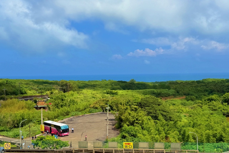 The Coral Shell Temple is decorated with corals and seashells from around the world. is located on a hillside overlooking the sea in New Taipei City's Shimen District, symbolizing its role as a spiritual guardian of the area.