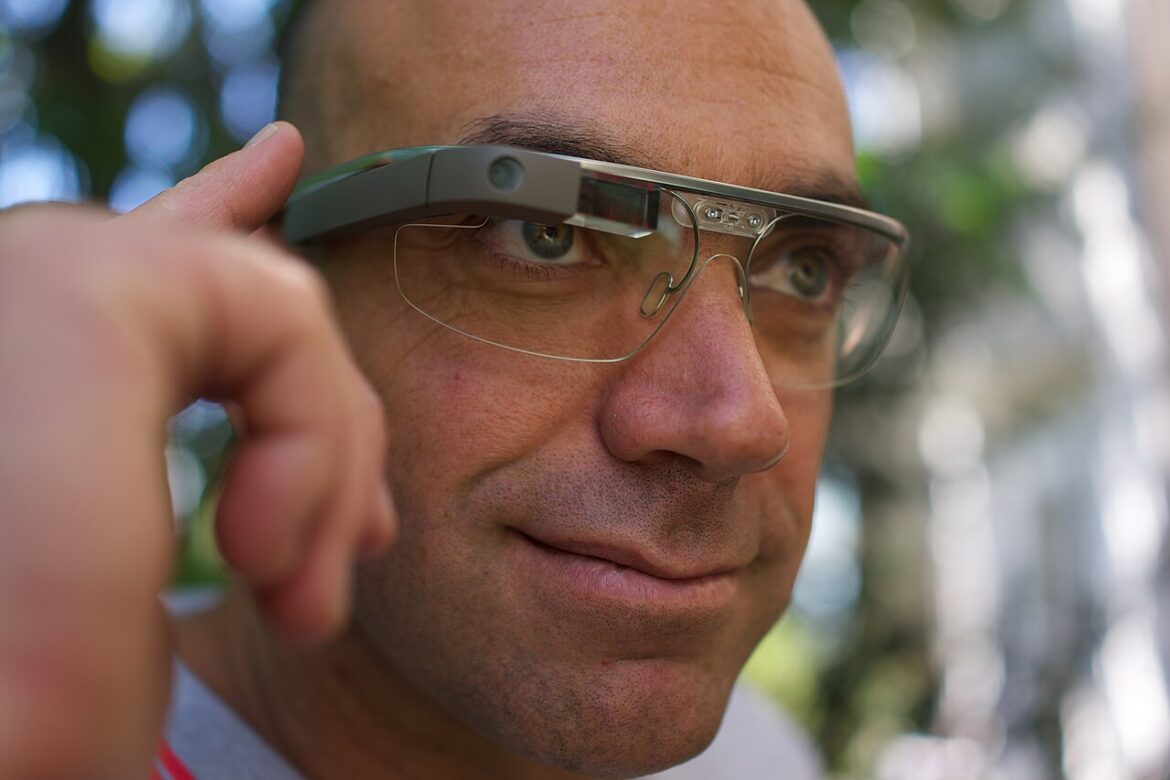 A man wearing smart glasses.
