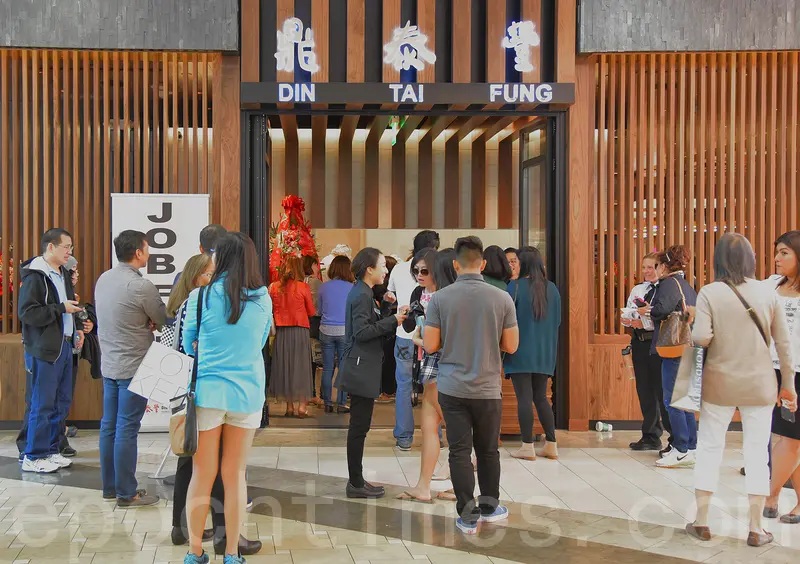 A crowd waits outside the Din Tai Fung restaurant in Nanwan, Taiwan.