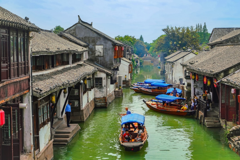 Boats on the canals of Zhouzhuang, China.
