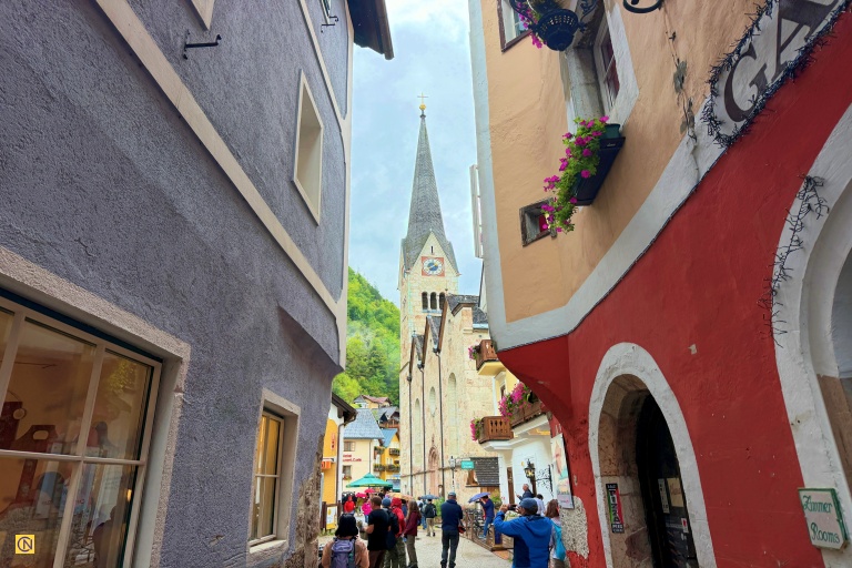Hallstatt’s narrow cobblestone streets are lined with colorful historic buildings.