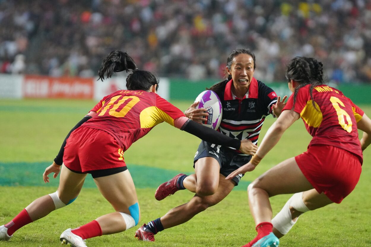 A Merit Award–winning frame from the Hong Kong Sevens: the moment before contact, held still.