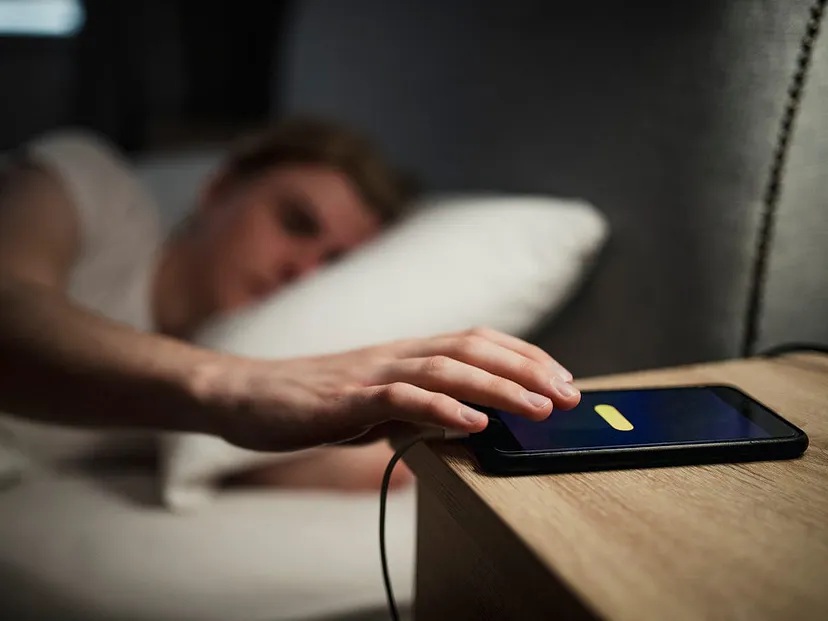 If charging at bedtime, make sure you’re not tucking your phone under a pillow or other bedding, which could trap heat and risk overheating the device.