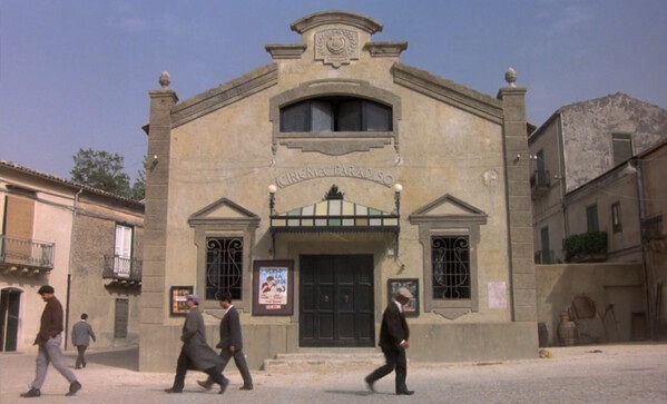 The local movie house, the Paradiso, serves as the sole sanctuary for a traumatized populace seeking refuge from daily struggle.